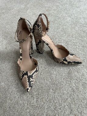 Aldo Snake-Print Pointed Toe Ankle Strap Heels in Beige and Black